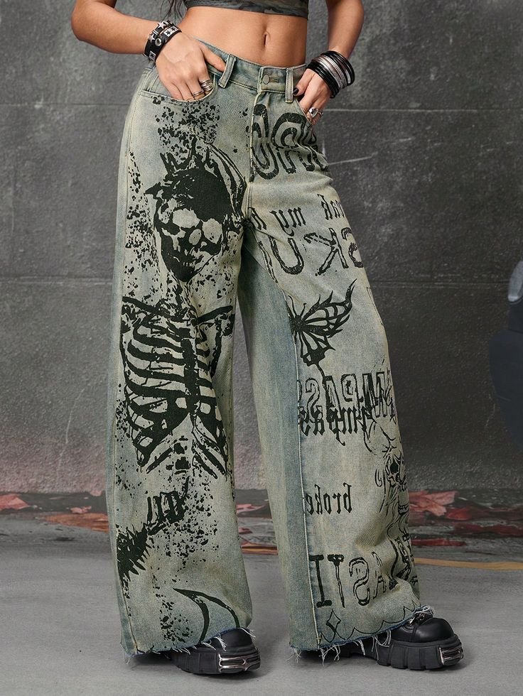 grey-green jeans with black paintings containing morely skull work on it