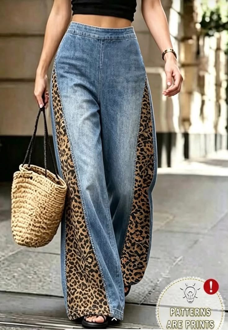 blue denim with wide cuts of leopad print on it