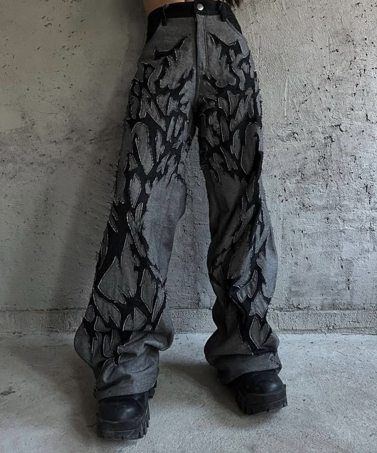 a blue grey denim having black velvet work on it