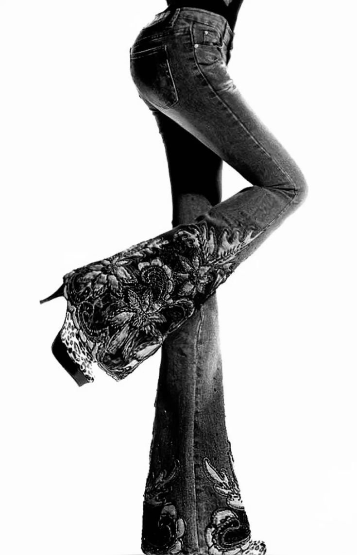 a black grey denim with velvet and thread work on it